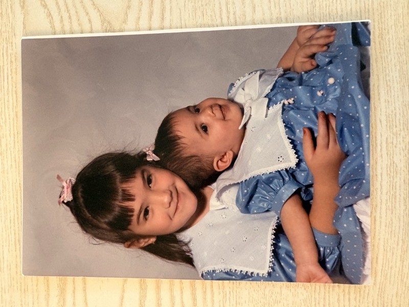 Michele as a child with her sibling