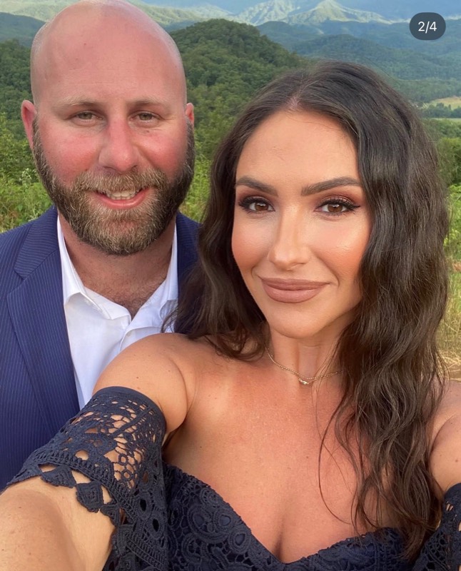 Michele with her partner in the mountains